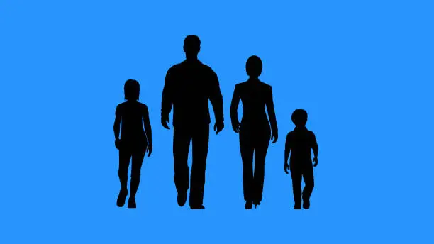 Photo of Family walking together. Parents and their children