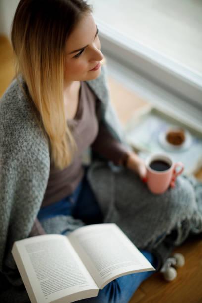 istock Young woman relaxing at home 1138653749