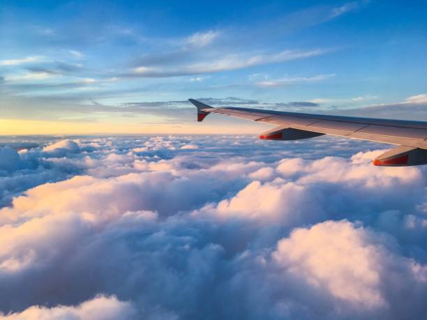 istock Wing of an Airplane at Sunset 1138654994