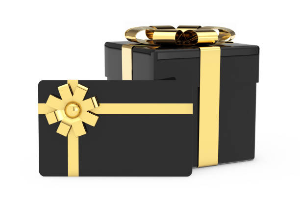 caja de regalo de cardoard negro, tarjeta de regalo negra con lazo dorado y arco. renderizado 3d - cardoard fotografías e imágenes de stock