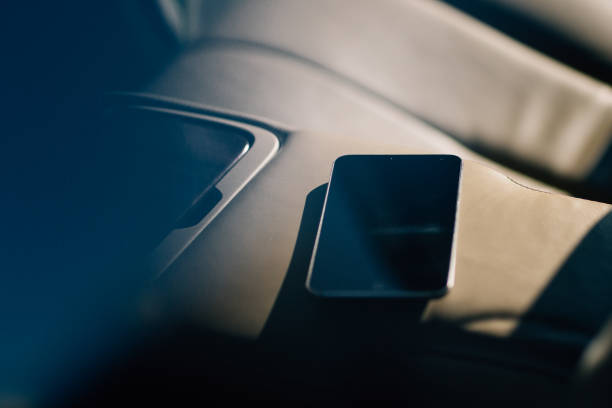 istock smart phone phone on the car seat dashboard 1138658878