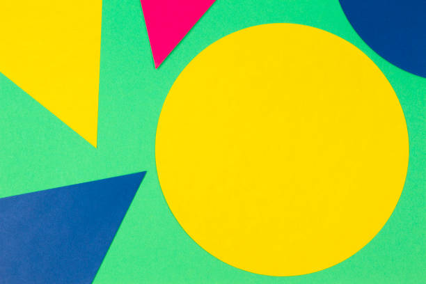 istock Abstract color paper texture background. Colorful round circle triangle shape geometry composition on light green background. Top view 1138659381