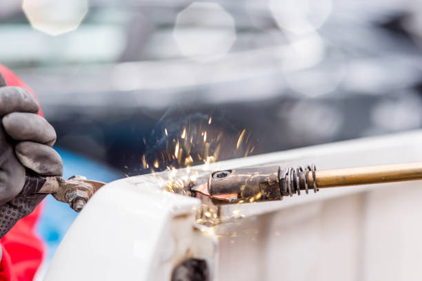 istock young worker repairing a car 1138659873