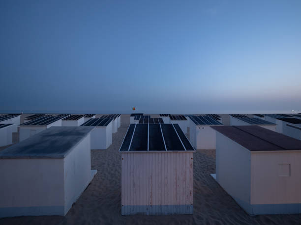 White beach cabins on the sandy beach along the North Sea, Nieuwpoort,Belgium.