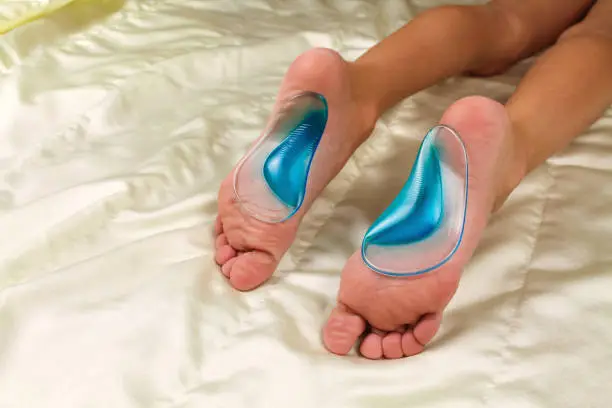 Orthopedic insoles for children's feet. Treatment of flatfoot.