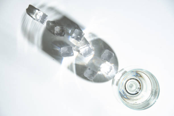 istock Water in a glass cup and shade on the table.  Top view. 1138665745