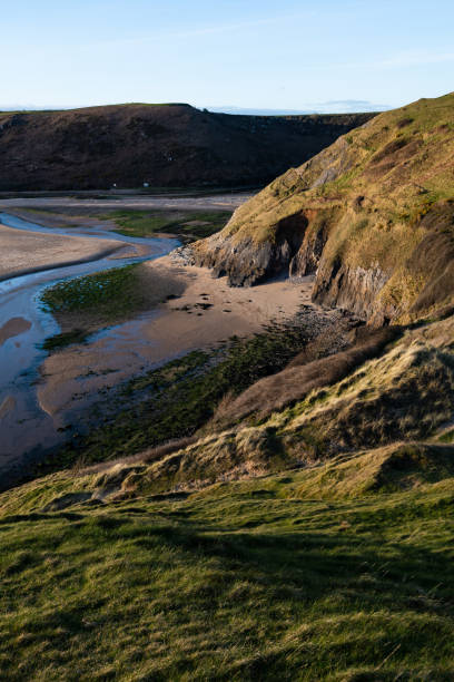 istock Aerial view of Three Cliffs Bay south coast beach 1138666108