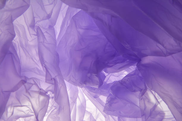 istock Plastic bag background. Purple abstract soft background. Suitable as a blank for a wedding invitation, greeting card or advertising. Plastic concept. 1138666898