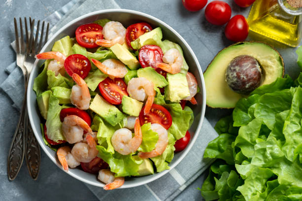 istock Salad with shrimps, avocado and cherry tomatoes. 1138667763