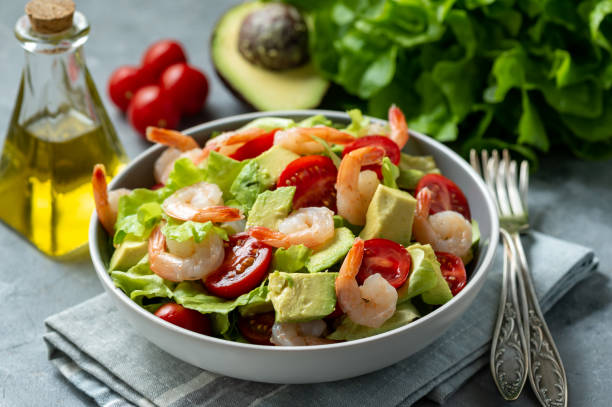 istock Salad with shrimps, avocado and cherry tomatoes. 1138667764