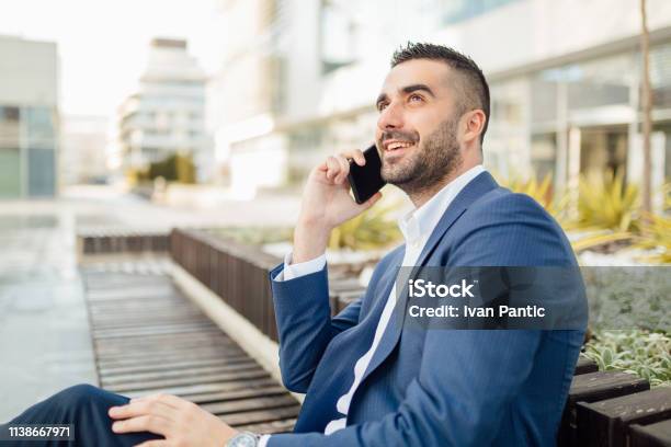 Handsome Businessman Working On The Go Stock Photo - Download Image Now - Adult, Adults Only, Beard