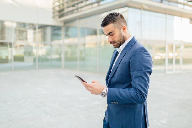 istock Handsome businessman working on the go 1138668074