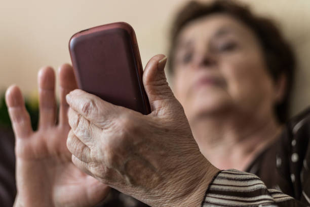 istock Senior woman sending a text message on her phone 1138670962