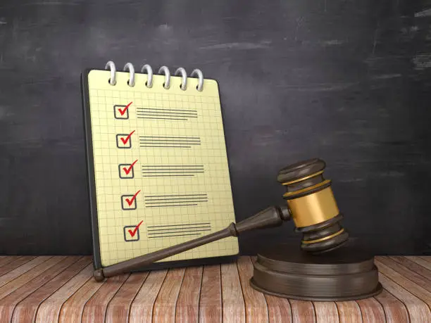 Check List Note Pad with Gavel on Chalkboard Background  - 3D Rendering
