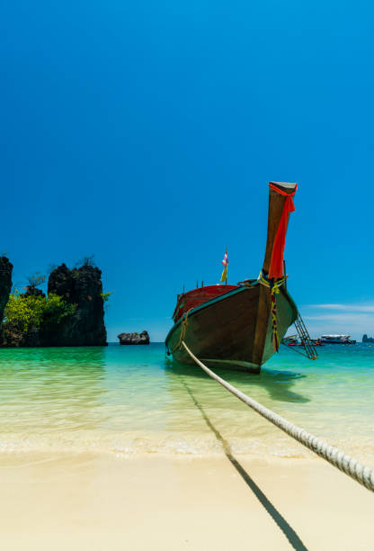 istock Longtail boat at tropical beach, Andaman Sea 1138671897