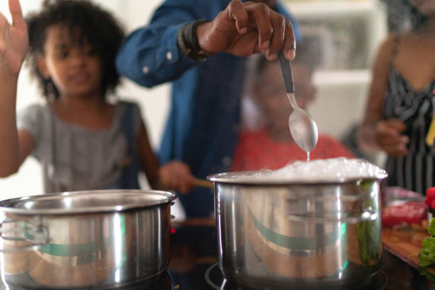 istock Family Cooking Together at Kitchen 1138676595