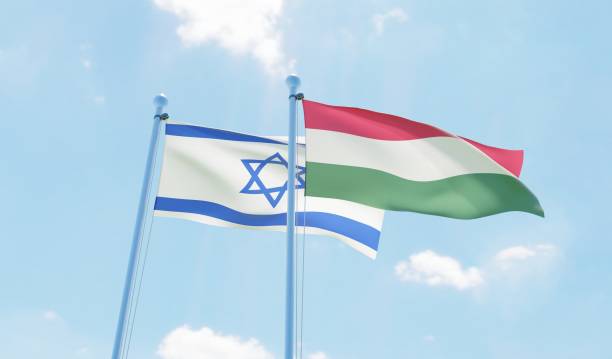 istock Hungary and Israel, two flags waving against blue sky 1138677885