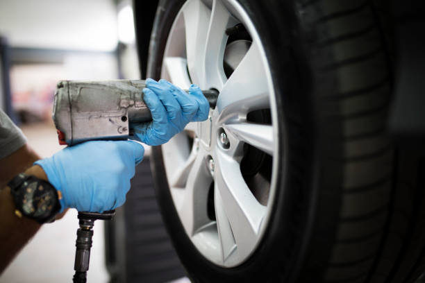 istock Tire changing at car service 1138677899
