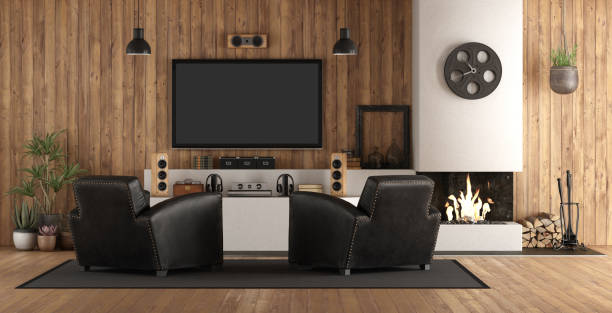 Home cinema in rustic style Home cinema in rustic style with black armchair, fireplace and wooden paneling - 3d rendering
Note: the room does not exist in reality, Property model is not necessary entertainment center stock pictures, royalty-free photos & images
