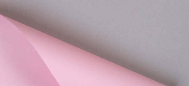istock Abstract geometric shape pastel pink and gray color paper background 1138678565