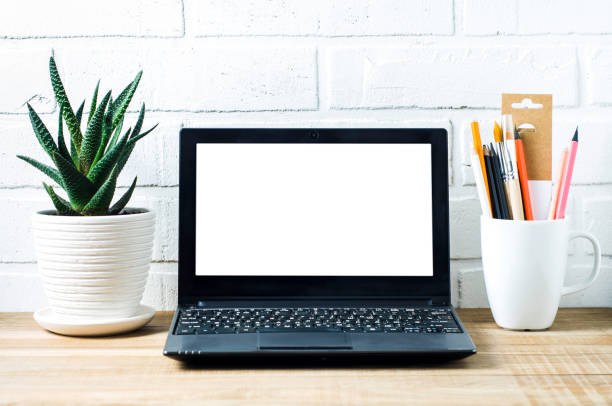 istock Laptop on a wooden desktop. Template for text or design. Home office concept 1138679222