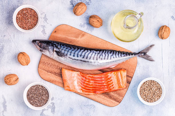 sources of omega 3 - mackerel, salmon, flax seeds, hemp seeds, chia, walnuts, flaxseed oil. - nutritional supplement salmon food flax imagens e fotografias de stock