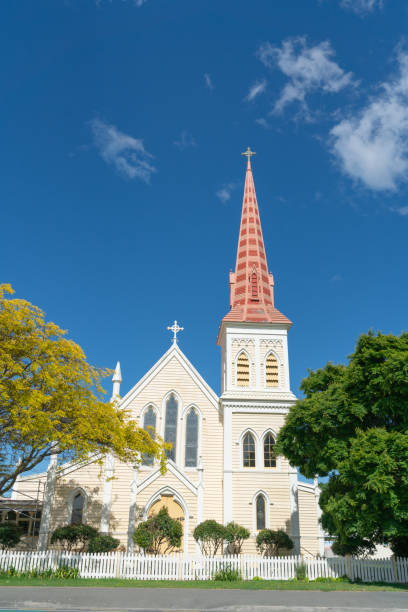 St. Mary's Catholic Church in Blenheim with tall historic  pink clad bell tower Marlborough district New Zealand in October 2018