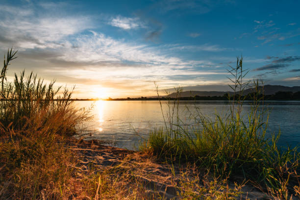 view over the Zambezi river at colorful sunrise hour
