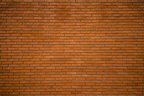 istock brick wall, wide panorama. Wall brick masonry, brick background texture. 1138682881