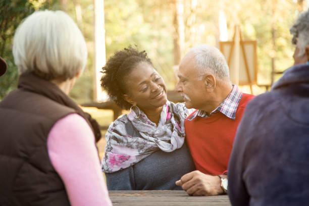 istock Active senior adult couple enjoy outdoor park. 1138683075