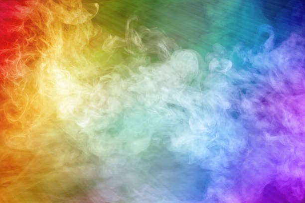 istock Abstract fantastic image with heavenly light and rainbow colored smoke 1138684219