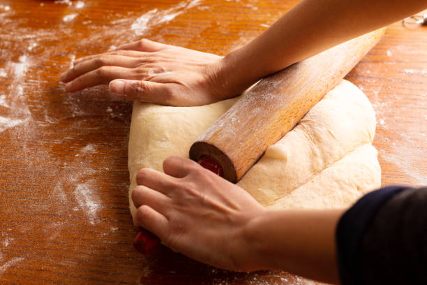 istock Food bakery concept making bread dought for Cinnamon Roll Braided Bread with copy space 1138685838