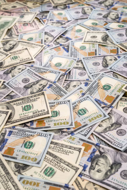 istock Background of 100 new and old dollar bills 1138685926