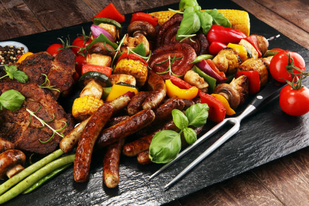 istock Assorted delicious grilled meat and skewer with vegetable on rustic table 1138686639