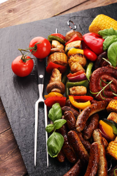 istock Assorted delicious grilled meat and skewer with vegetable on rustic table 1138686738