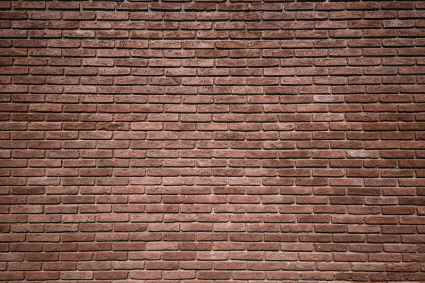 istock brick wall, wide panorama. Wall brick masonry, brick background texture. 1138690332