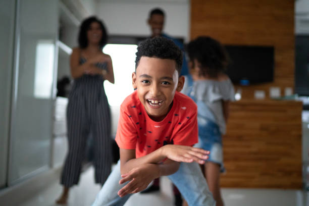 istock Latin family dancing together in the kitchen 1138691197