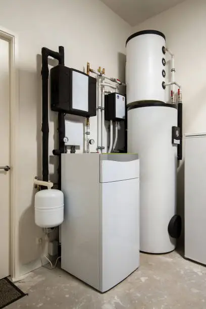 Photo of Modern sustainable heat pump installation for heating water and houses