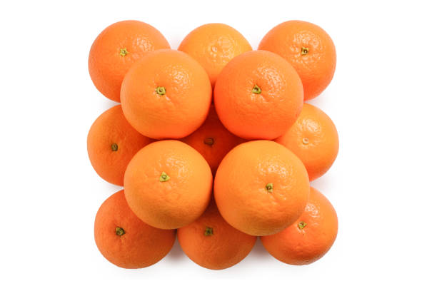 istock Pyramid of Oranges isolated on white background. 1138694359