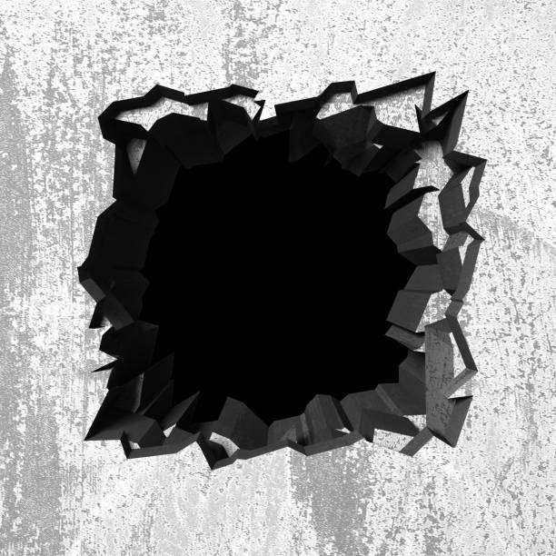 istock Dark cracked broken hole in concrete wall 1138695831