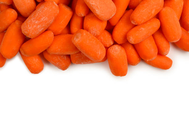 istock Little fresh carrots as a background. Snack. 1138696290
