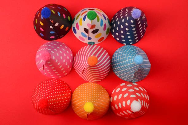 istock Colorful birthday caps on a red background. 1138696292