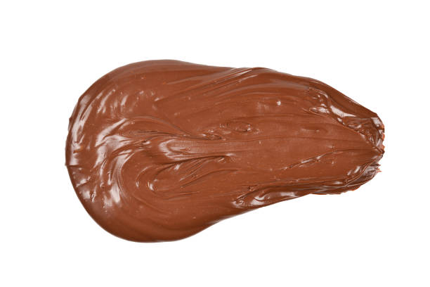 istock Chocolate cream background. Space for text or design. Isolated on white. 1138696304