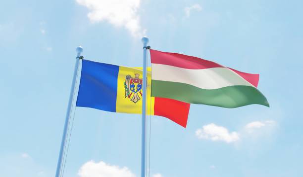 istock Hungary and Moldova, two flags waving against blue sky 1138697927