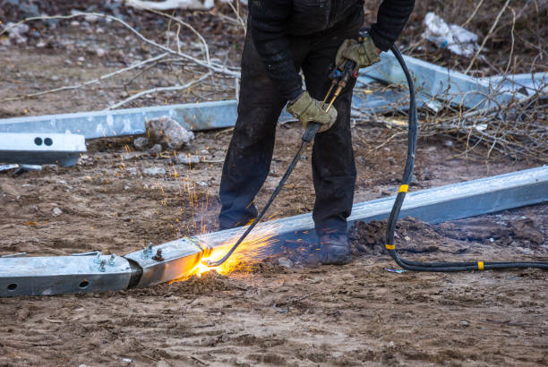 istock A worker cut steel beams using propane-oxygen torch.