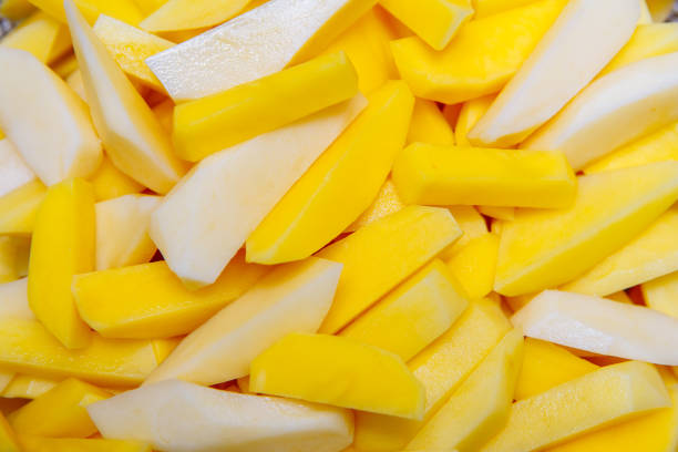 istock Potatoes cut into strips and lay in a fryer rack on the table 1138699315
