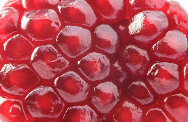 istock Macro photography pomegranate red seed can be used as a background 1138707618