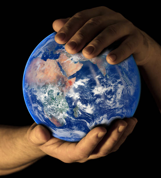 istock Earth in my hands - East view 1138708576