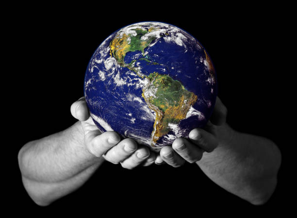 istock Hands holding the Earth with North America visible 1138708617
