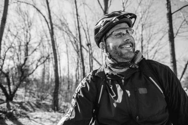 portrait of caucasian man biking - ontario spring bicycle city life imagens e fotografias de stock